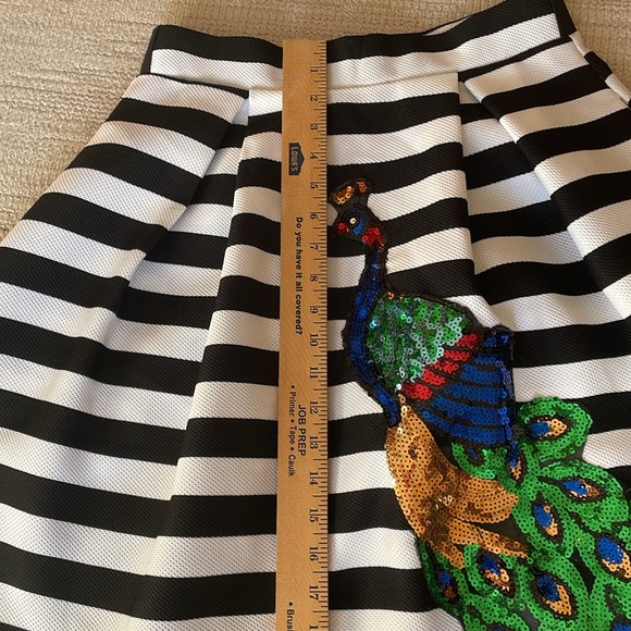 Bird sequence. Haute monde skirt - Picture 9 of 10